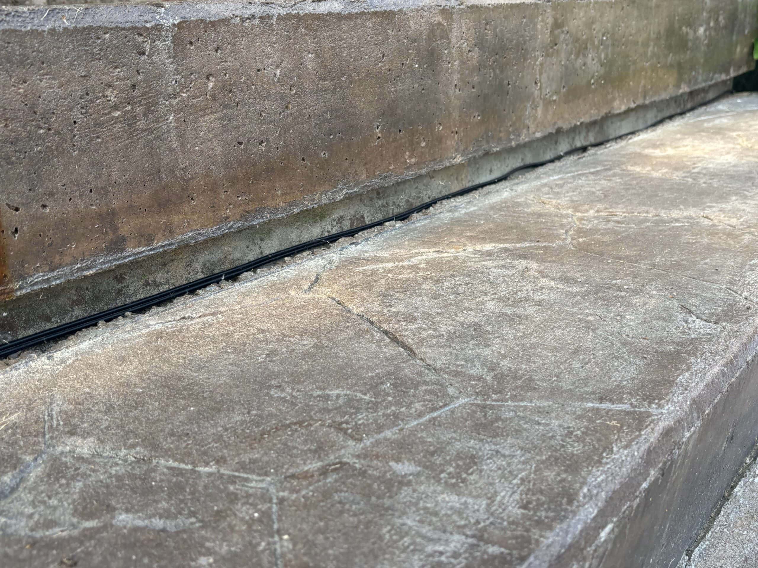 A concrete slab being prepared for a lifting foam application.